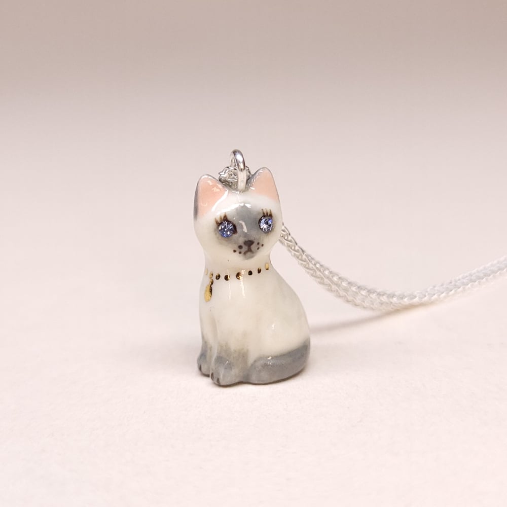 Image of Siamese Porcelain & Sterling Silver Sitting Kitten Pendant
