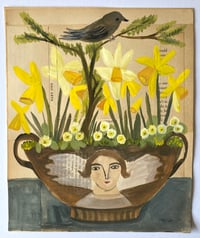 Daffodils and primroses in an angel dish 