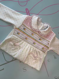 Image 1 of girls multi dot smocked babygrow