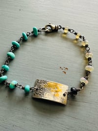 Image 1 of turquoise and opal charm bracelet . be the light quote bracelet