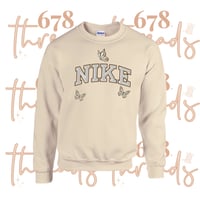 N 🦋 K E