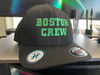 Black Flexfit hat with Green “Boston Crew" Logo