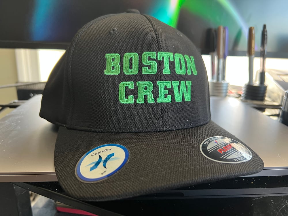 Black Flexfit hat with Green “Boston Crew" Logo