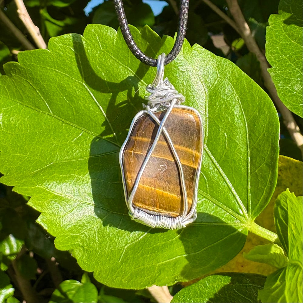 Image of tiger’s eye pendant c