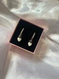 Image 1 of white heart hoop earrings