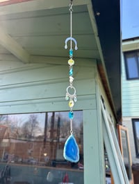 Image 1 of Storm Sun Catcher