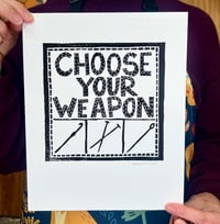 Image 1 of Choose Your Weapon