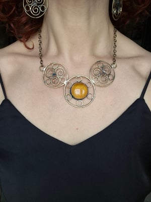 Sun necklace with yellow centre 