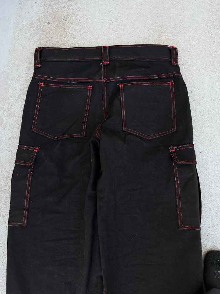 Image of red/blk web jeans 