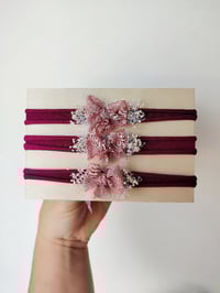 Image 1 of Headband noeud cerise