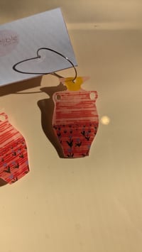 Image 1 of “she” poetry earrings