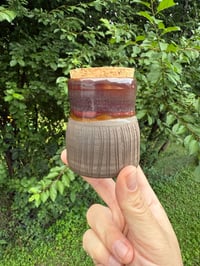 Image 1 of Black clay jar 