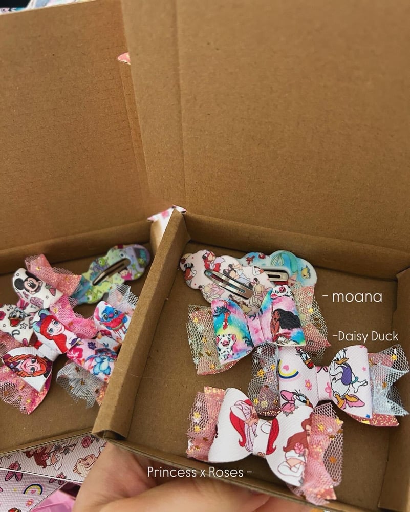 Image of £2.40 Disney bow sale 