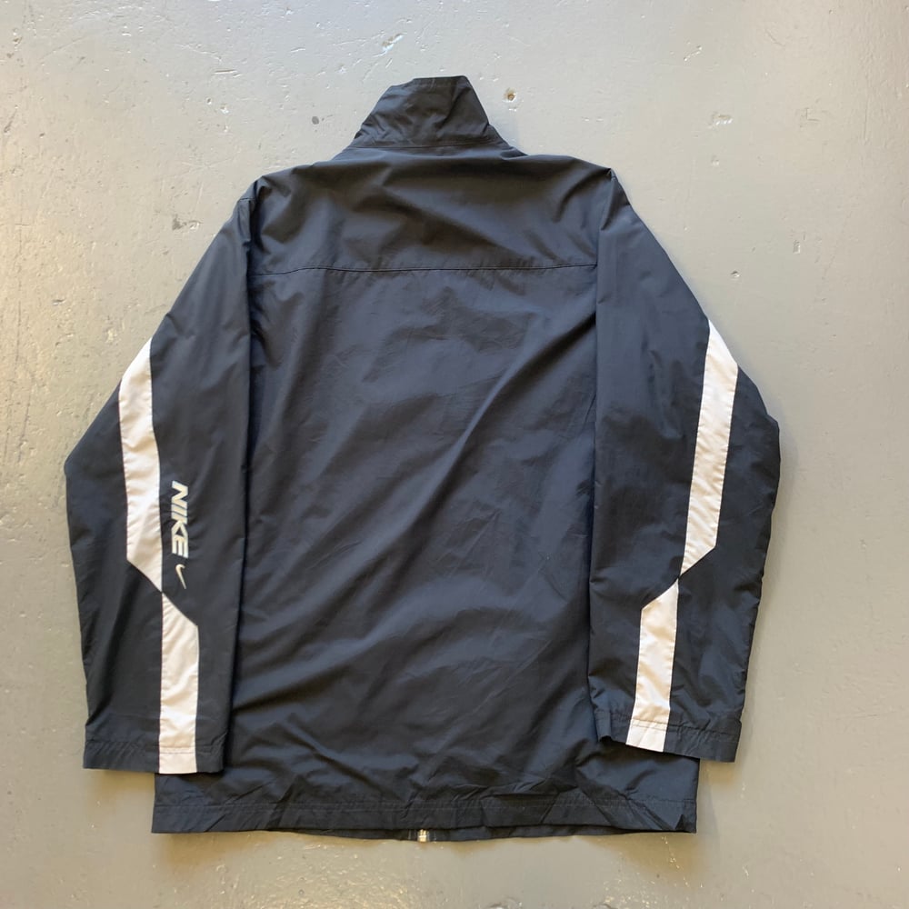 Image of Vintage Nike spellout windbreaker jacket size small 