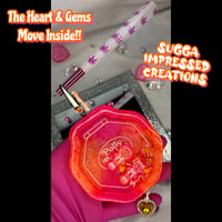 Image 1 of Sunrise Polly Pocket Shaker Clip