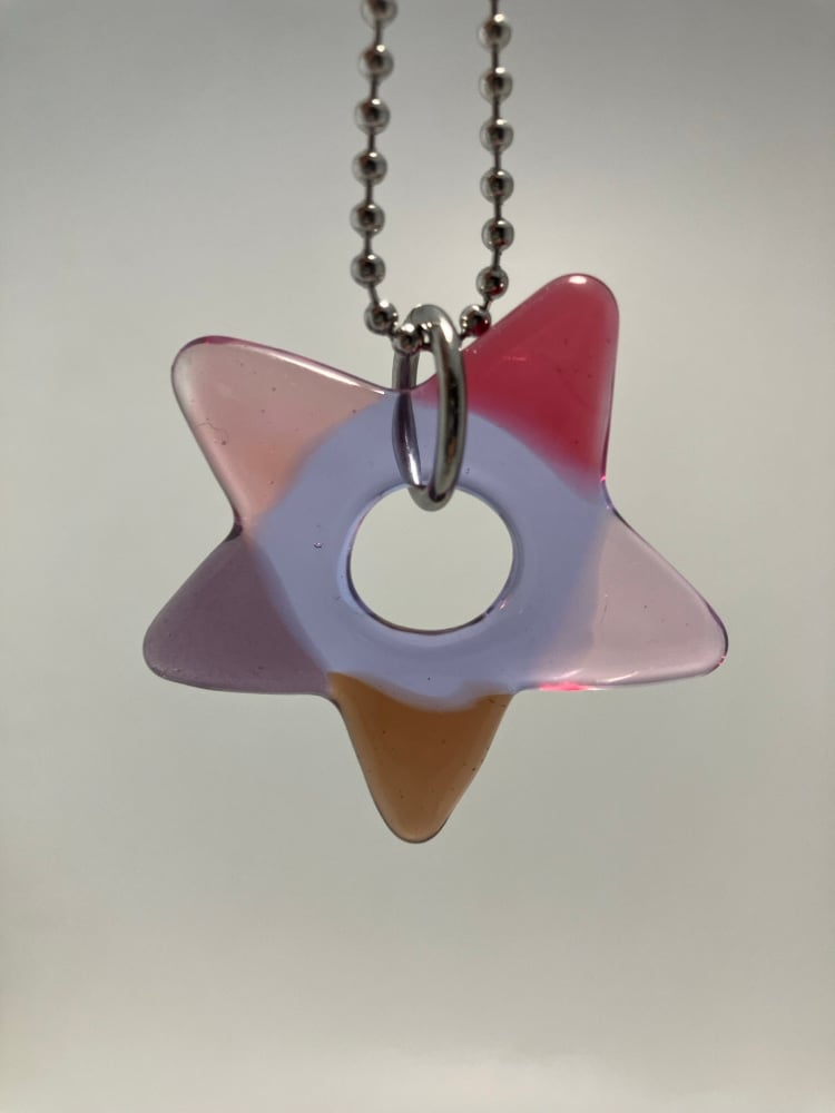 Image of red/pink/purple star