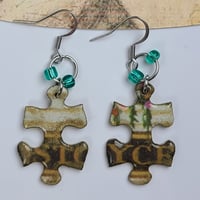 Image 1 of Puzzle Piece Earrings Script