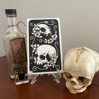 Image 4 of Human And Cat Skull Linocut Print