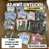Lot of 42 Brand New UNTUCKit pieces ($13 per unit)