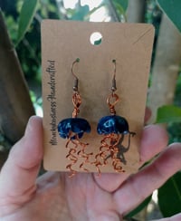 Image 1 of Dark blue and copper jellyfish
