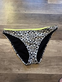 neon black and white swim bottoms