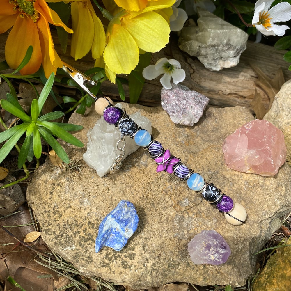 Image of purple shooting star roach clip