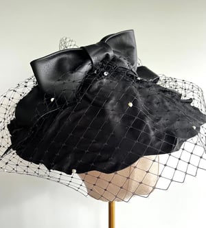 Image of Black leather saucer headpiece