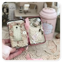 Image 8 of A Petite French tin with a needle book and tattered pin cushion