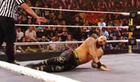 Shawn Spears ring worn black & gold tights