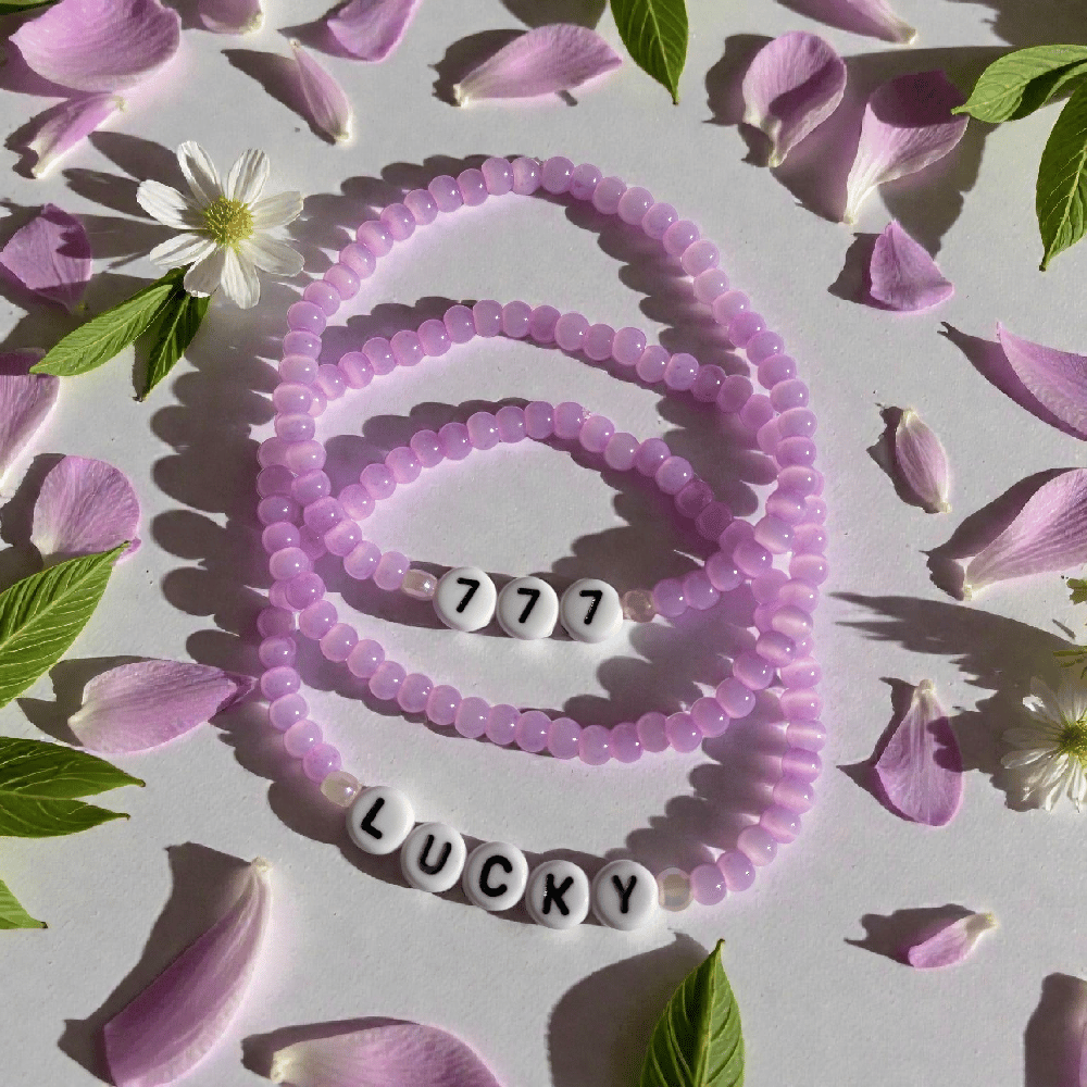 Image of The Lucky 777 Angel Number Bracelet Stack Lavender Glass Cat Eye Set