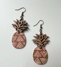 Image 2 of Wooden-topped pineapples