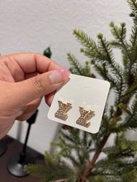 Image 1 of Silver or Gold