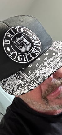 WL  Snap back black truckers hat paisley brim