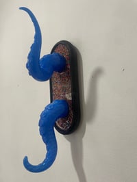 Image 3 of Blue  tentacles on black oval base with sprinkles 