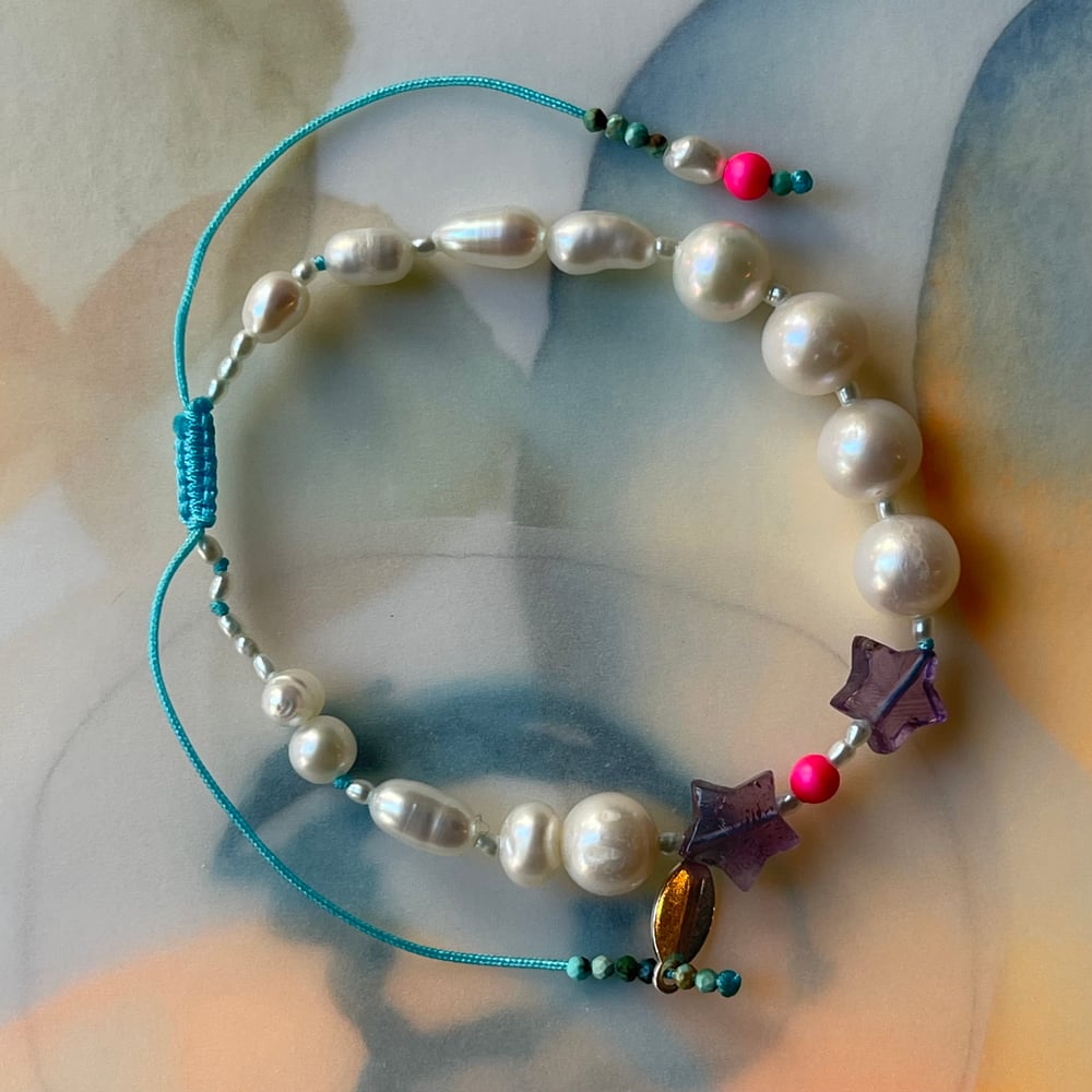 Image of pearl and amethyst bracelet