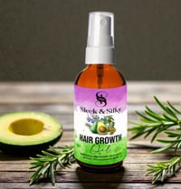 Image 1 of Sleek and silky hair  growth oil