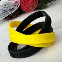 Image 5 of ALL 16 Tattd “love yourself” silicone wristbands
