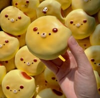 Image 1 of Puppy Bitten Bun Squishy