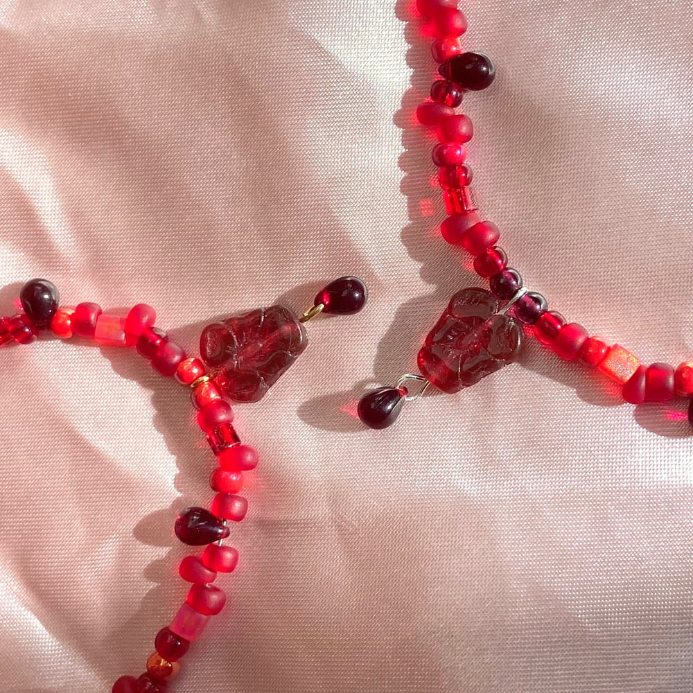 Image of bleeding-hearts flower necklace