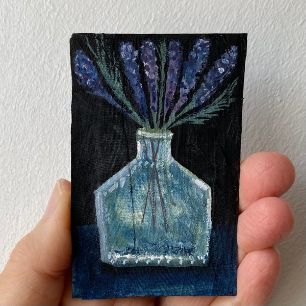 Image of lavender in an old ink bottle