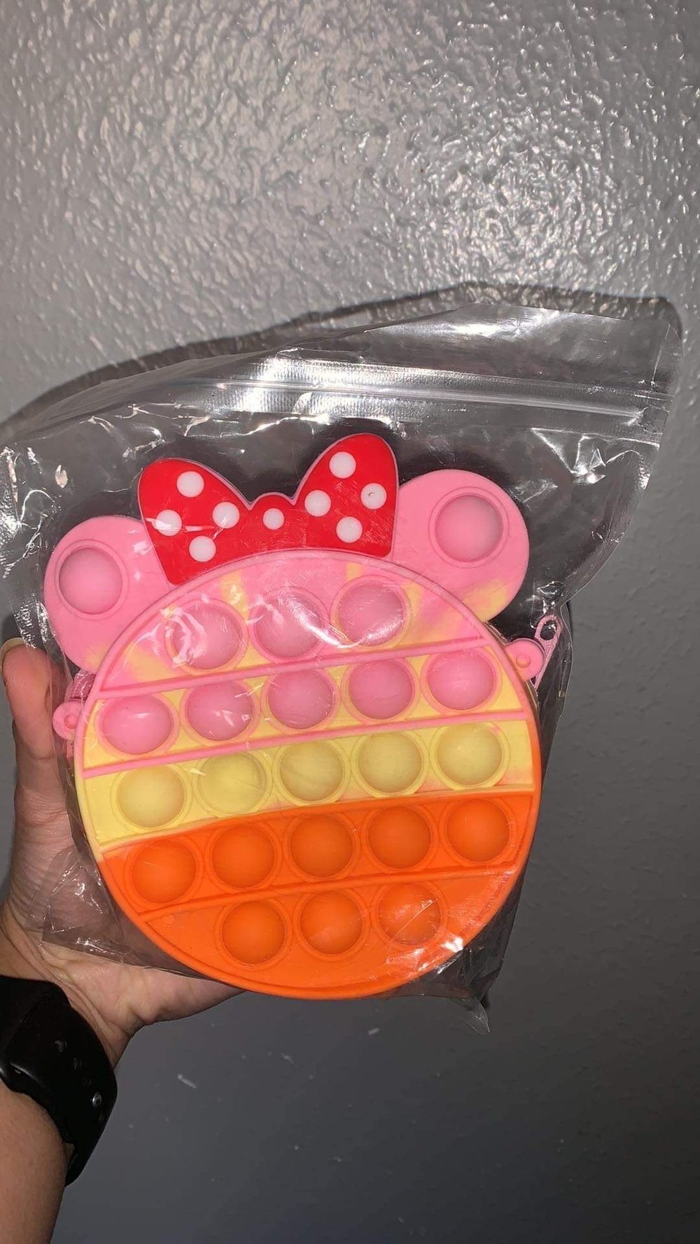 Image of Minnie pop it purse - pink yellow orange 