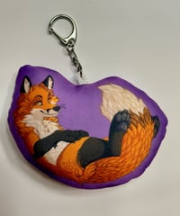 Image 3 of Plush lounging fox keychain 