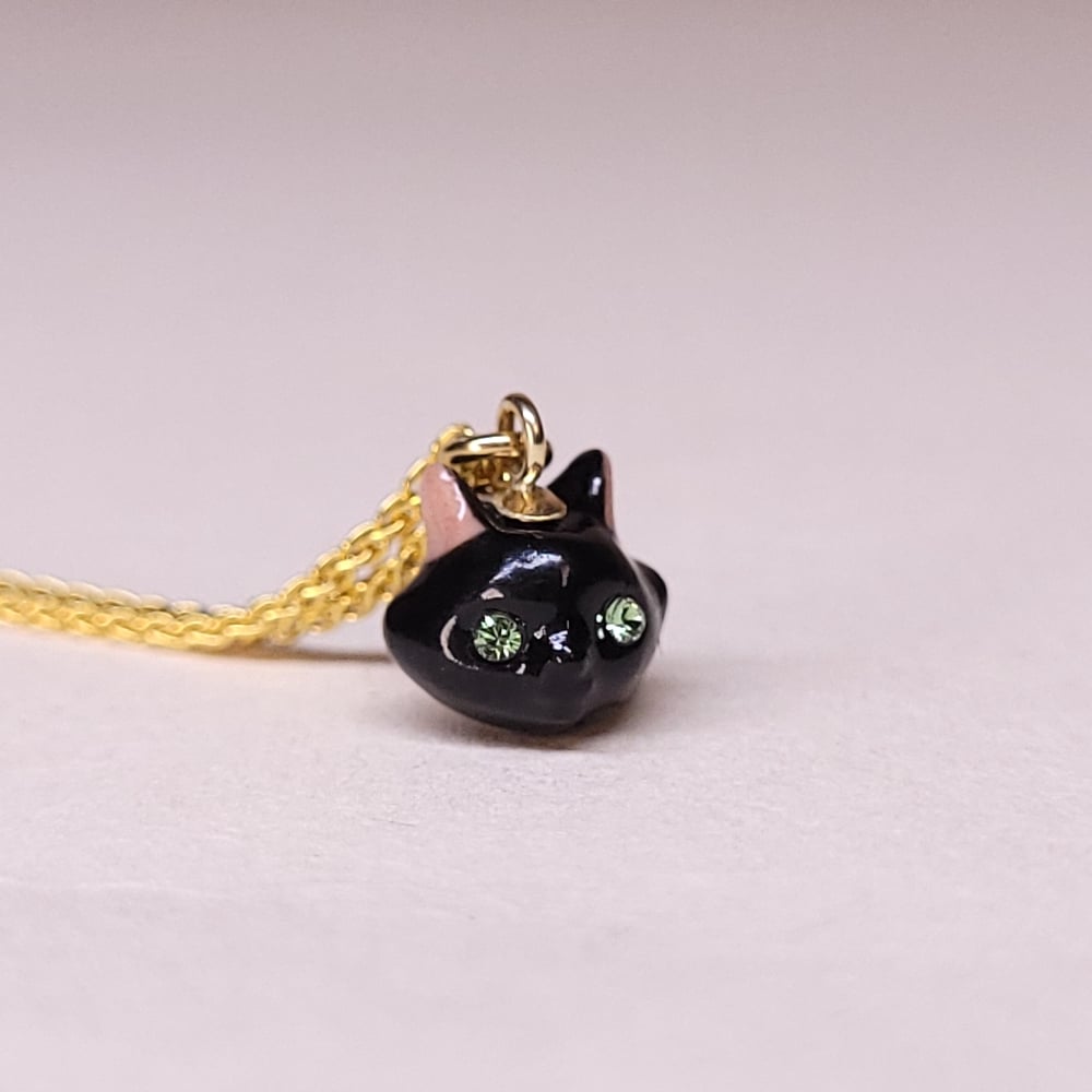 Image of Black Porcelain & Gold Vermeil Teeny Tiny Cat Pendant