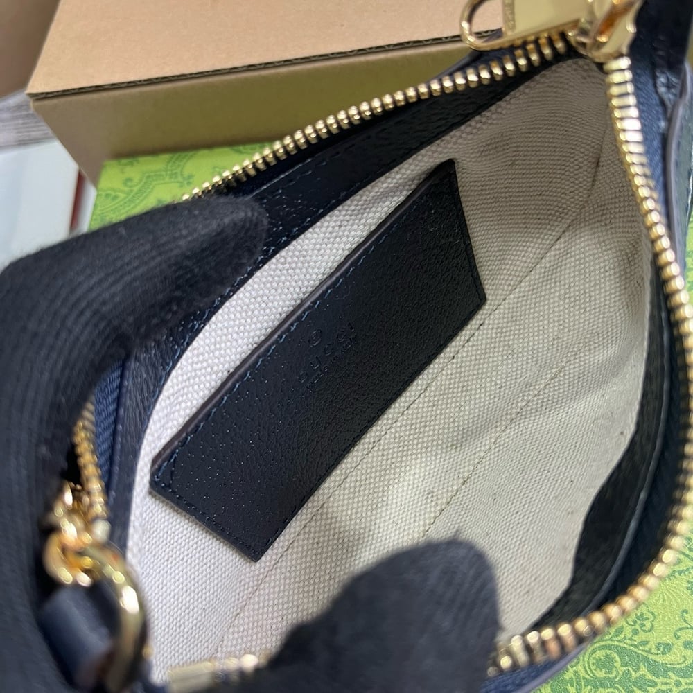 GG Canvas Mini Pochette 