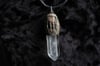 dead good ginuea pig paw and quartz pendant 