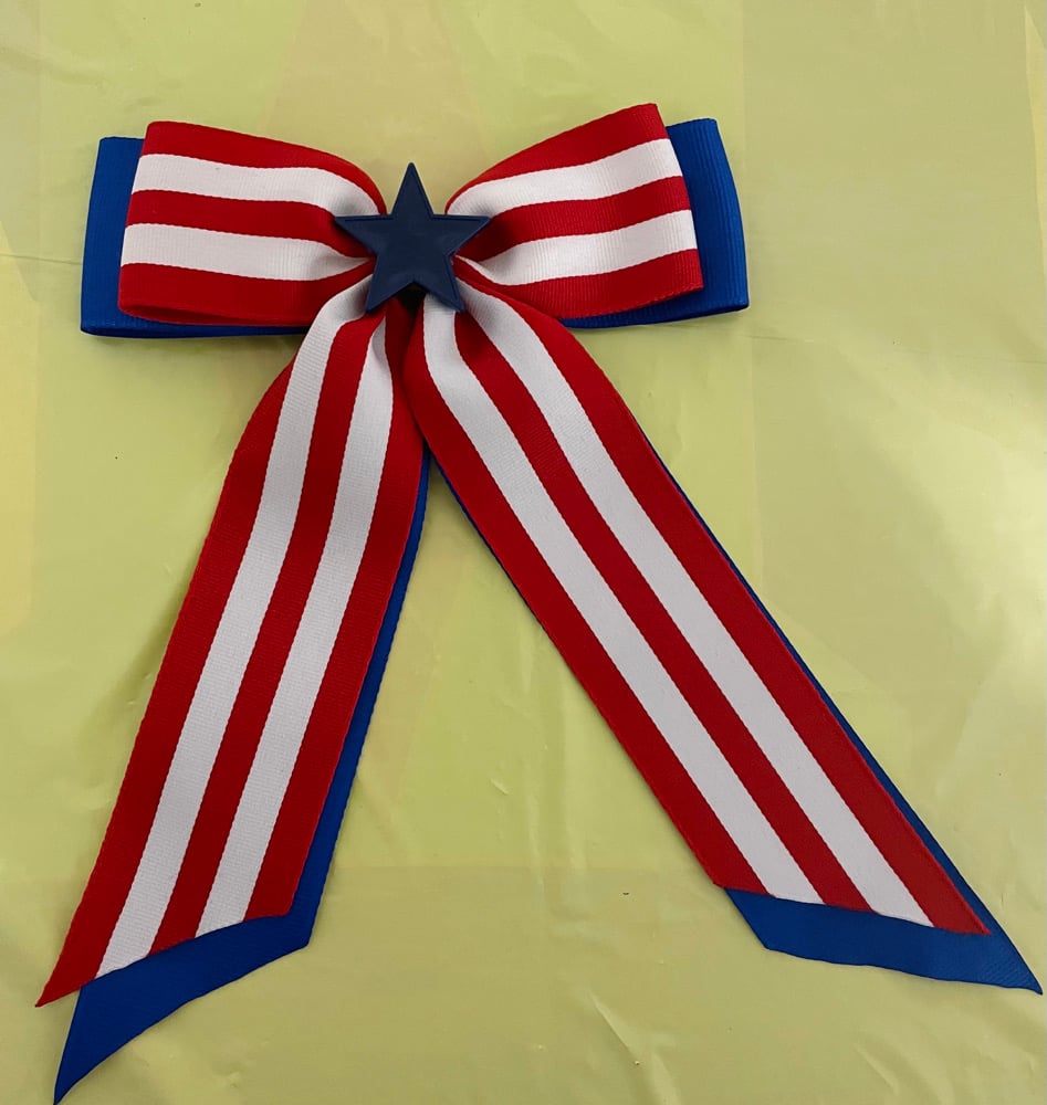 Red white and beautiful bow with tails