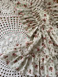 Image 1 of Sylvia Sitter  Romper