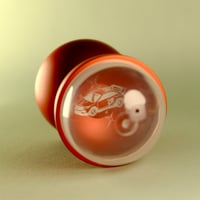 Image 3 of metal capsule (red race car)