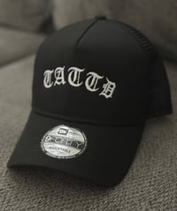 Image 1 of 25% off!!! BLACK & WHITE NEW ERA TATTD CAP!!! 🖤🤍