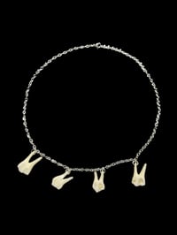 Image 1 of pig tooth necklace